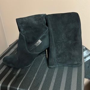 Coach mid rise boots.